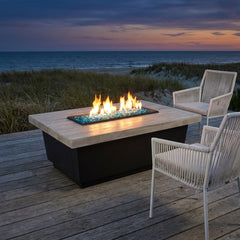 AFD Reclaimed Wood Contempo LP Select fire table with blue glass burning on a coastal deck