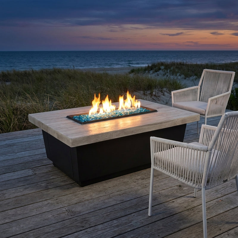 AFD Reclaimed Wood Contempo LP Select fire table with blue glass burning on a coastal deck