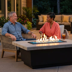 Couple around the AFD Contempo LP Select fire table at dusk