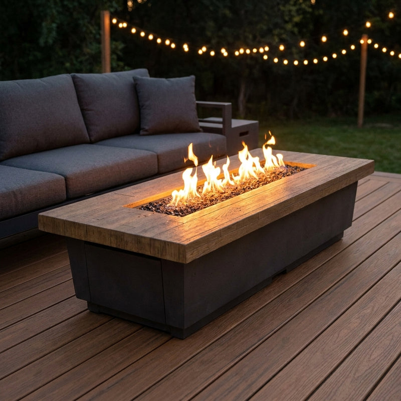 AFD Reclaimed Wood Contempo LP Select Long fire table burning on a cedar deck at dusk