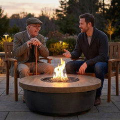 Father and adult son around the AFD Contempo Round fire table at dusk