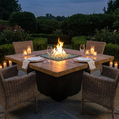 AFD Reclaimed Wood Cosmopolitan Square dining fire table set for dinner at dusk