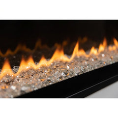 Flame detail: Dimplex Ignite Evolve 100 slim built-in linear electric fireplace glowing in an evening interior