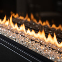 Flame detail: Dimplex Ignite Evolve 50 slim built-in linear electric fireplace glowing in an evening interior