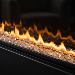 Flame detail: Dimplex Ignite Evolve 60 slim built-in linear electric fireplace glowing in an evening interior