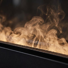 Flame detail: Dimplex Opti-myst Pro 1000 built-in water-vapor firebox in a travertine hotel wall at evening