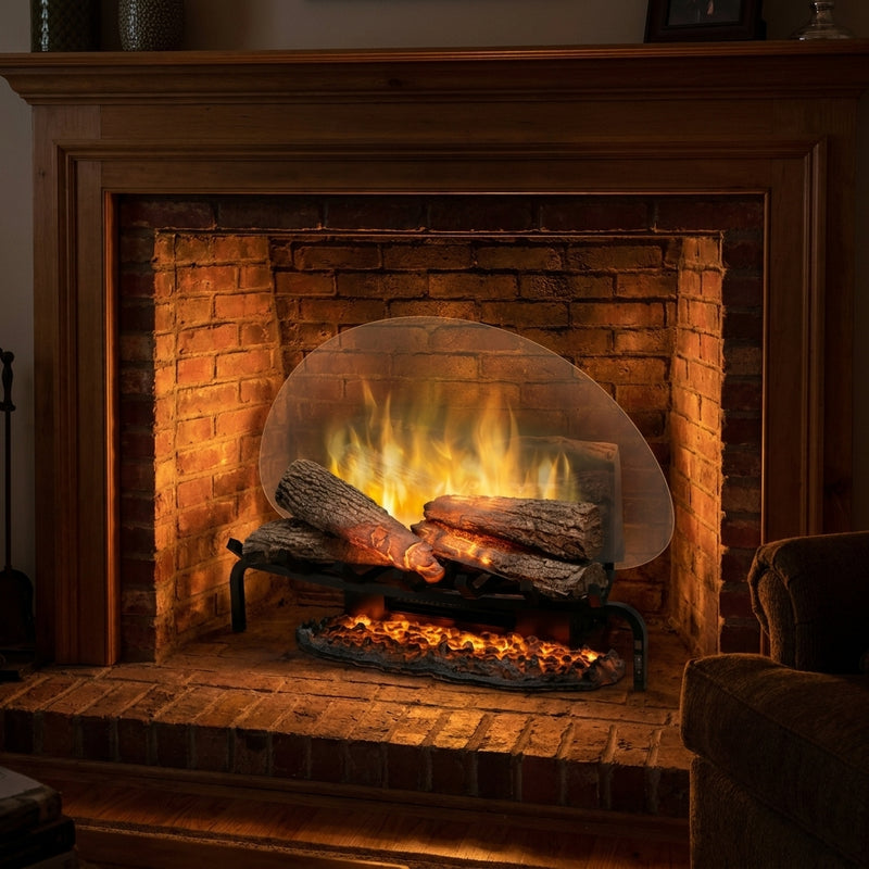 Dimplex Revillusion 25 electric log set glowing inside an existing brick fireplace at night