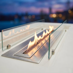 Close-up of the clean stainless ethanol burner and glass panels of the Elementi Sydney