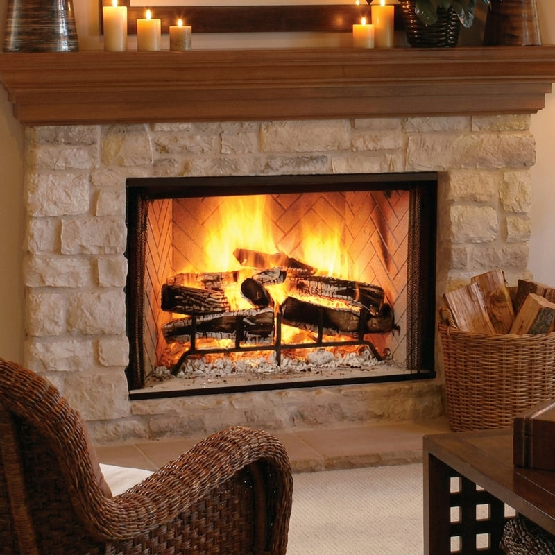 Majestic Biltmore 42 wood burning fireplace with herringbone brick interior burning in a limestone surround