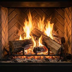 Flame detail: Majestic Biltmore 50 wood burning fireplace with herringbone brick interior blazing in a stone chimney