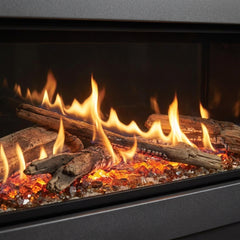 Flame detail: Majestic Echelon II 36 see-through linear gas fireplace in a room divider, burning at evening