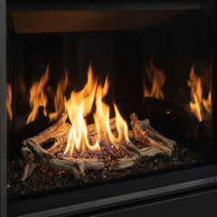 Flame detail: Majestic Meridian 42 Modern gas fireplace with reflective black glass interior in a concrete wall, burning
