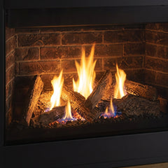 Flame detail: Majestic Quartz 36 NG direct vent gas fireplace, burning at evening